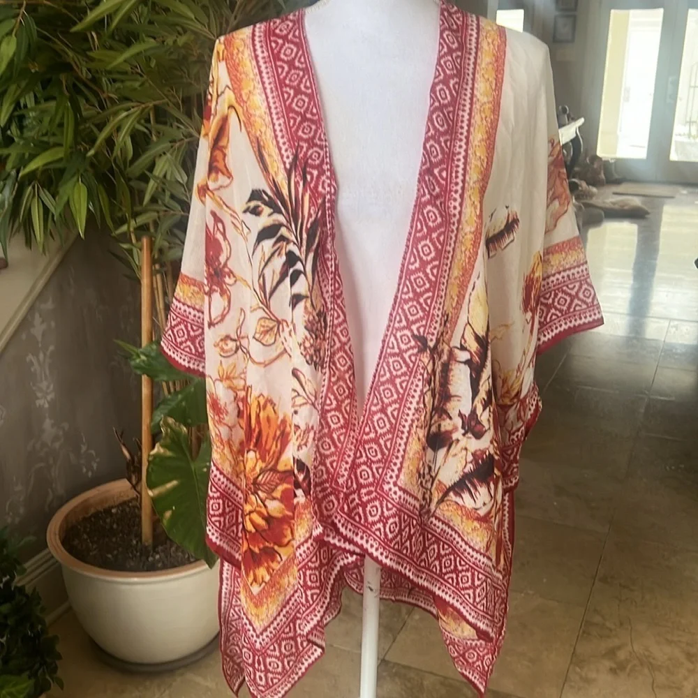 Vince Camuto ladies wrap one size NWOT. Cream yellow and red colors one size